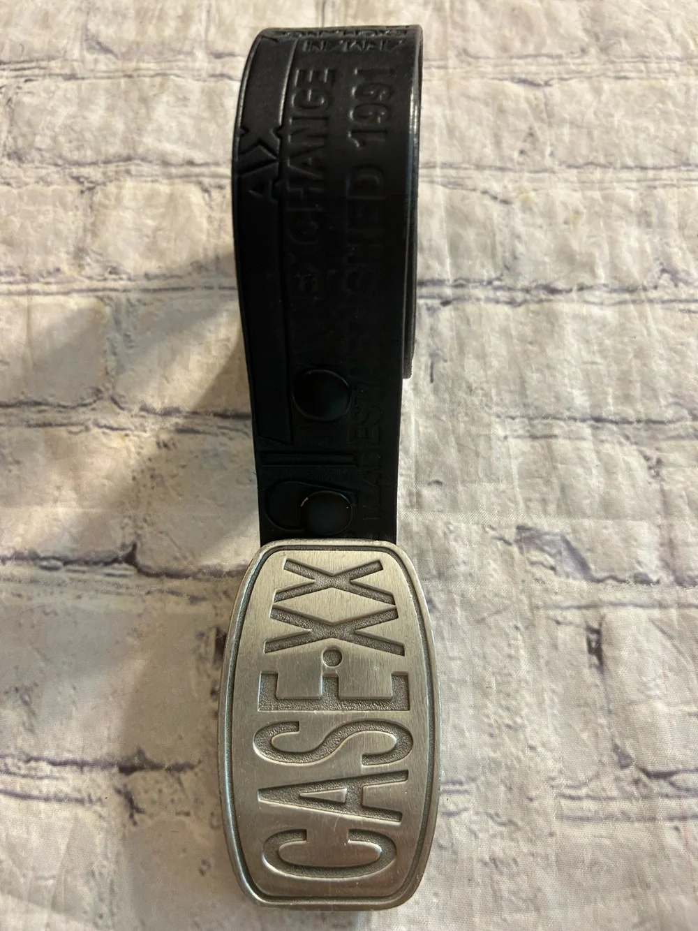 ARMANI EXCHANGE BLACK LEATHER LOGO EMBOSSED BELT CASE.XX FINE PEWTER BUCKLE